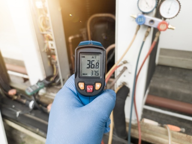 640 Professional Engineer Wearing Blue Gloves Using Thermo Gun For Temperature Check On The Hvac Air Cinditioning Syatem Temperature Check Concept On The Compressor Condensor Refrigerant System Hvac
